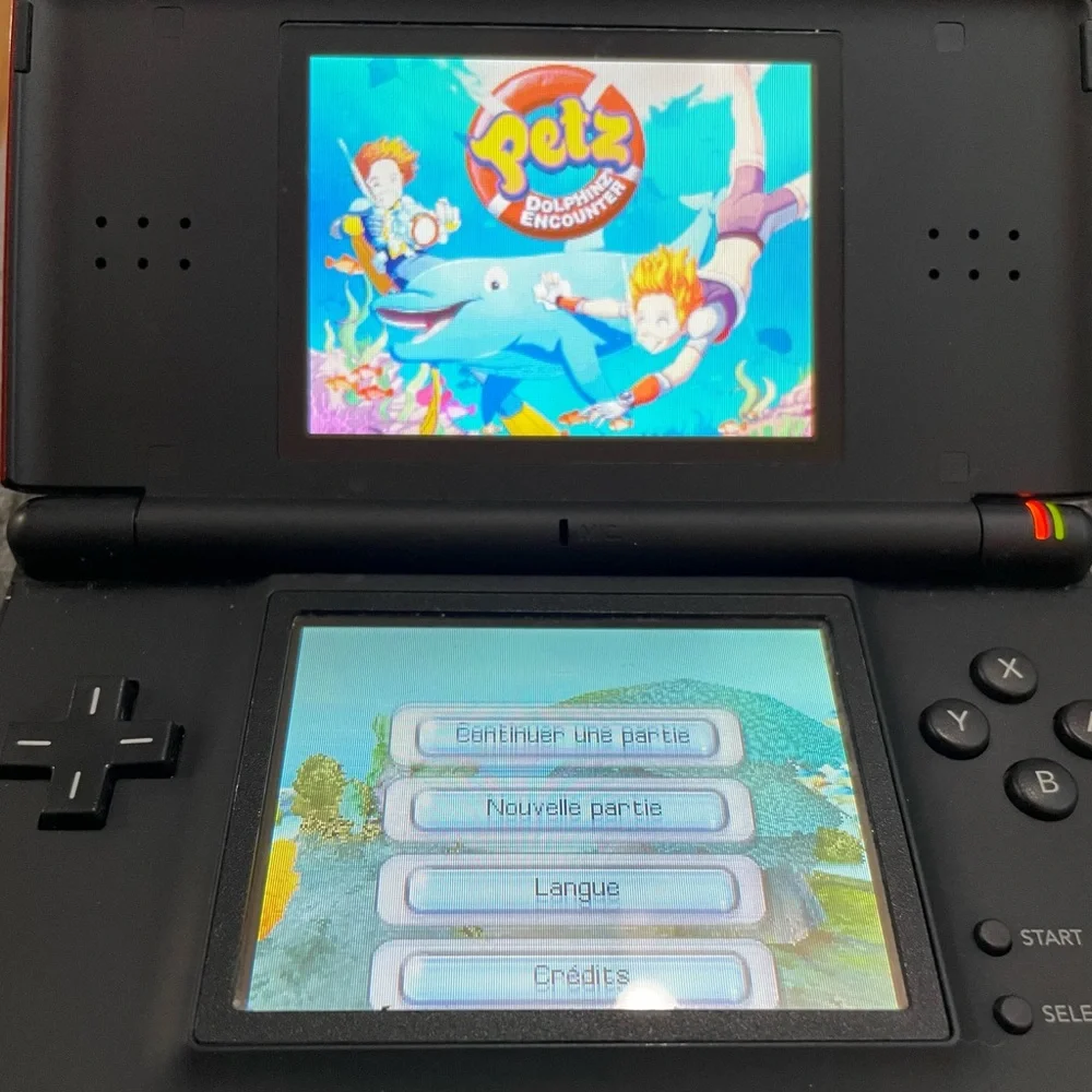 Nintendo DS Lite- excellent condition - comes with 13 games +